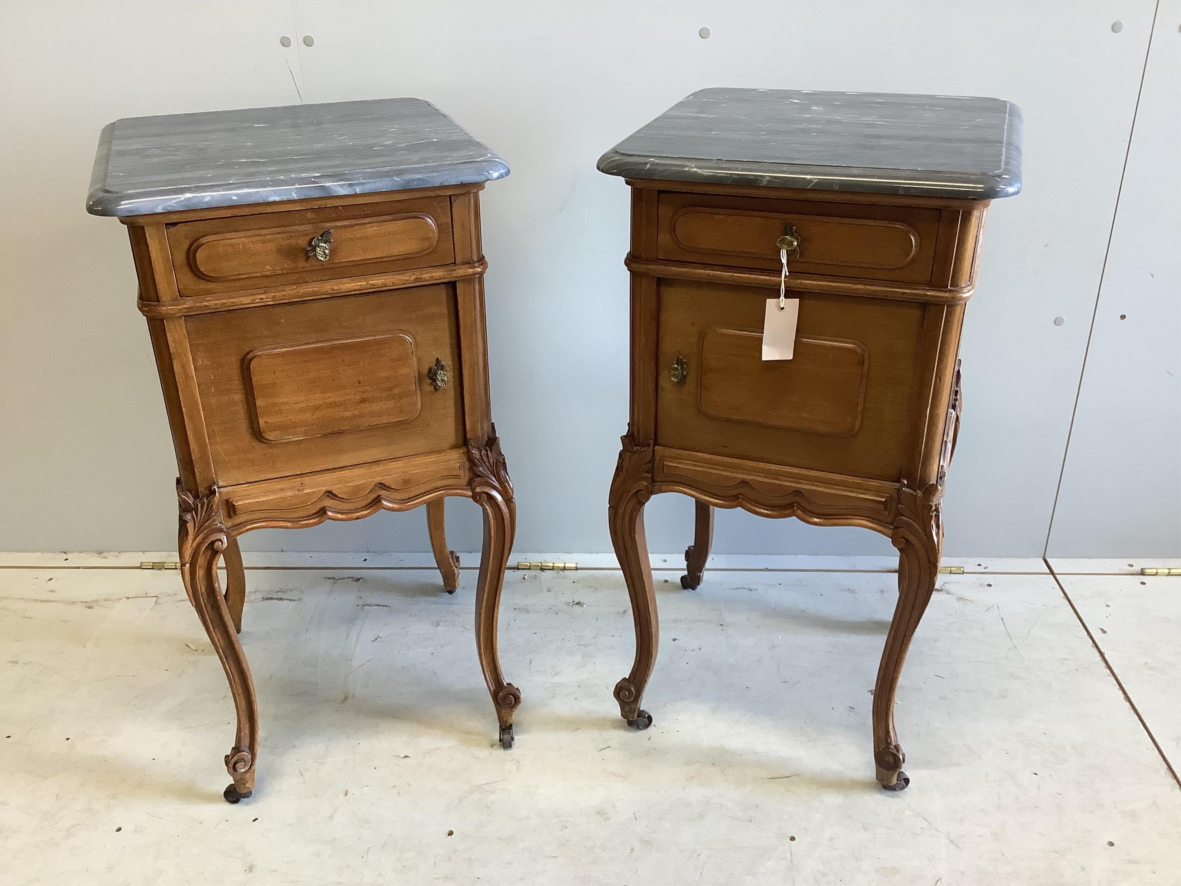 A pair of late 19th / early 20th century French mahogany marble top bedside cabinets, width 43cm, depth 43cm, height 83cm. Condition - good